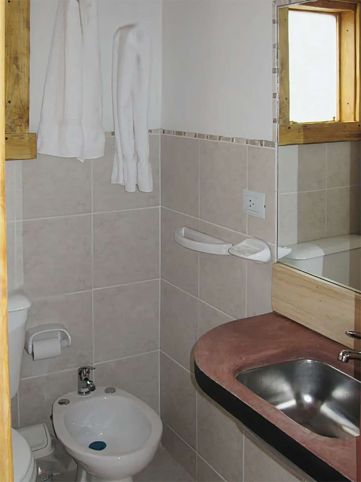 Bathroom with toilet, bidet and sink
