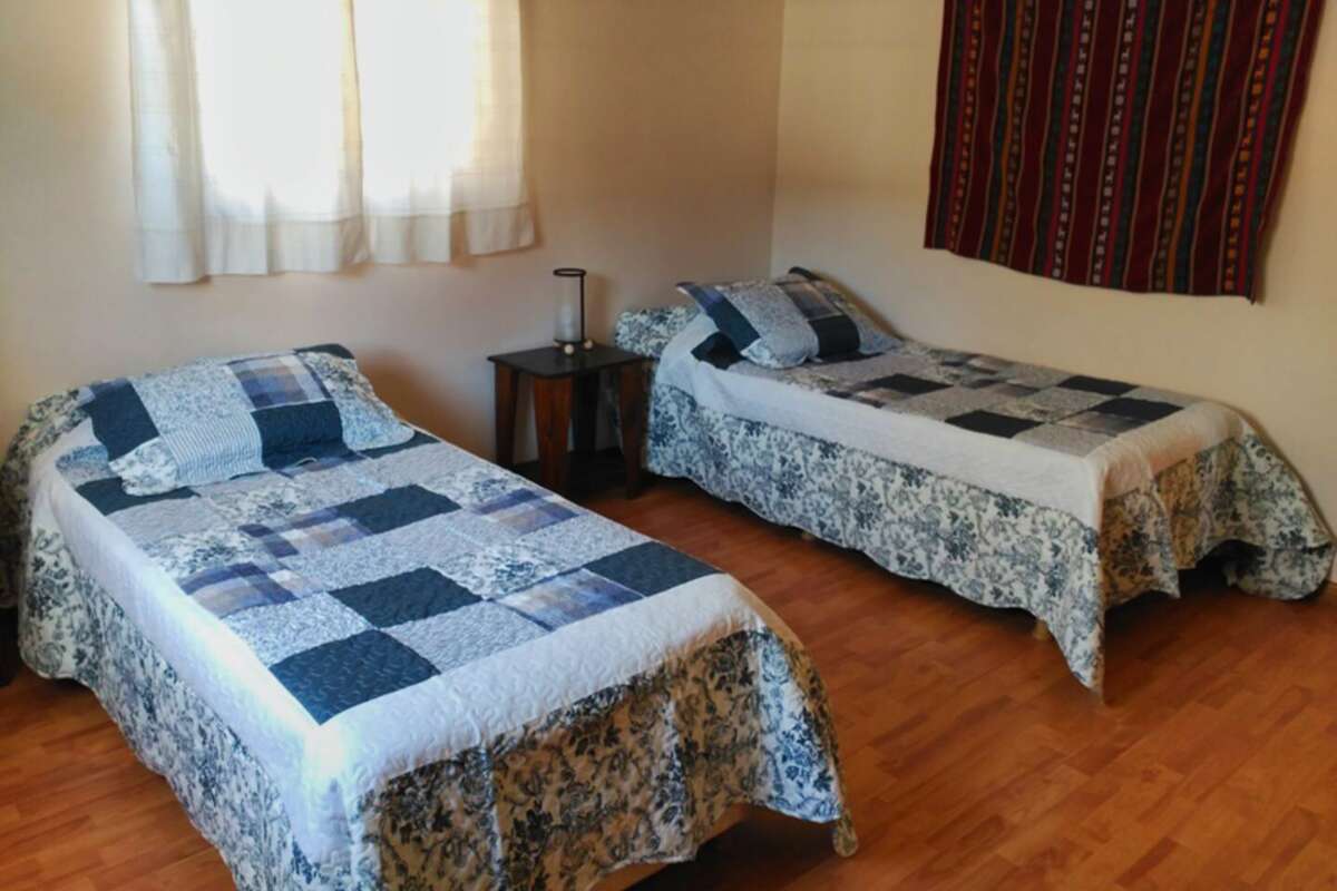 Room with two single beds